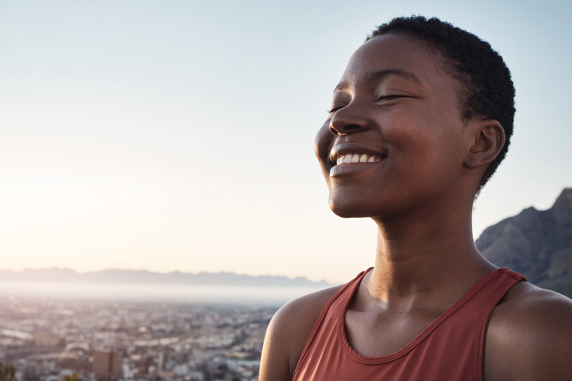black-woman-fitness-and-smile-for-mountain-hiking-2023-01-06-16-34-25-utc.jpg